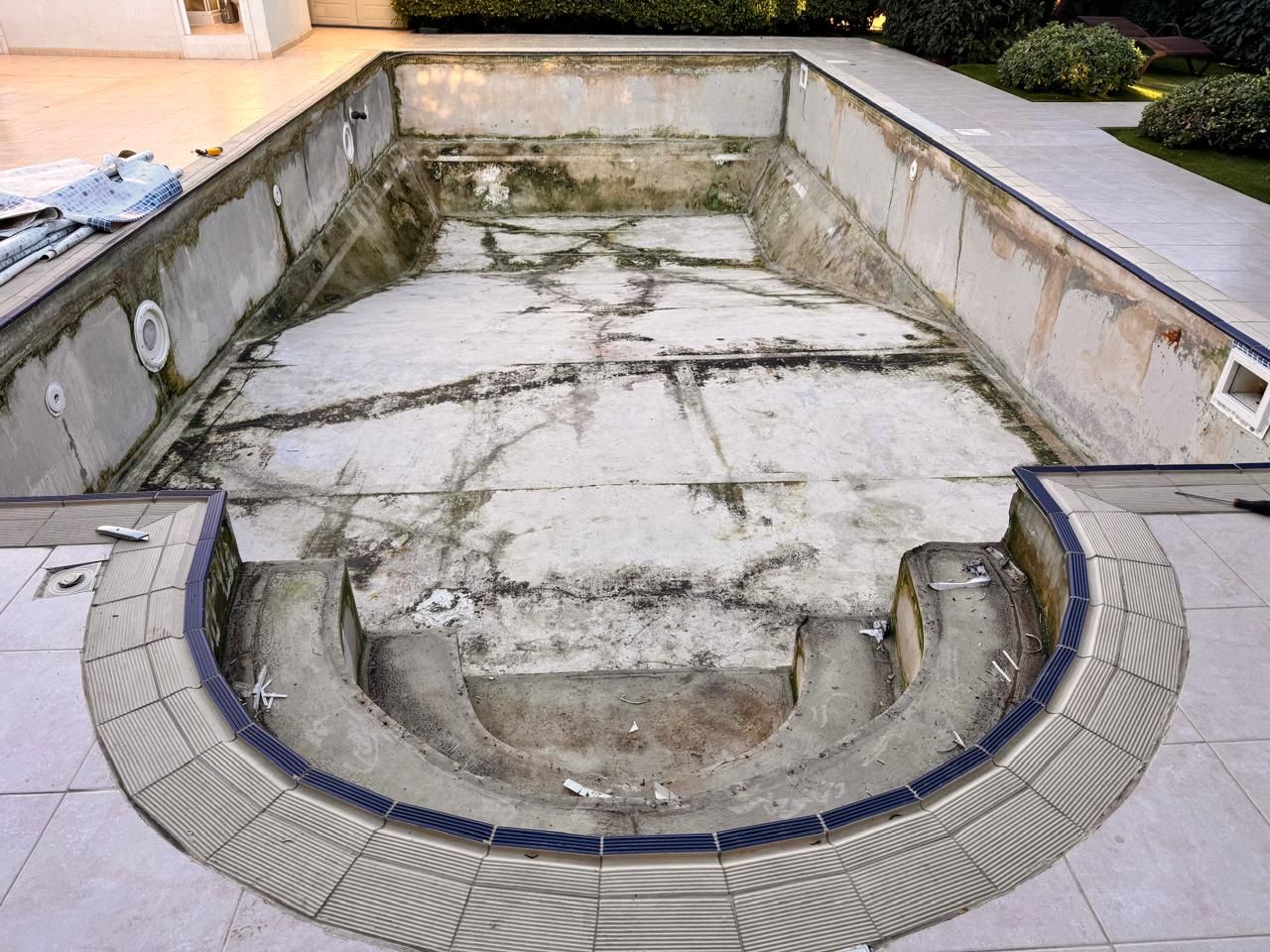 Existing swimming pool before new liner installation