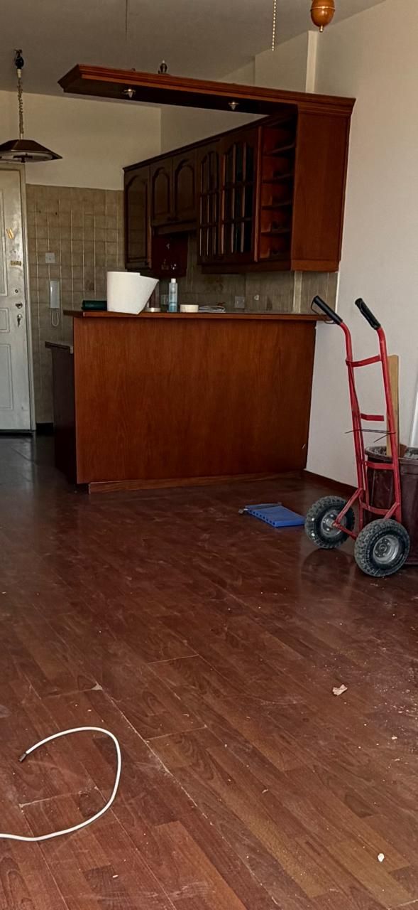 Original kitchen and flooring before renovation