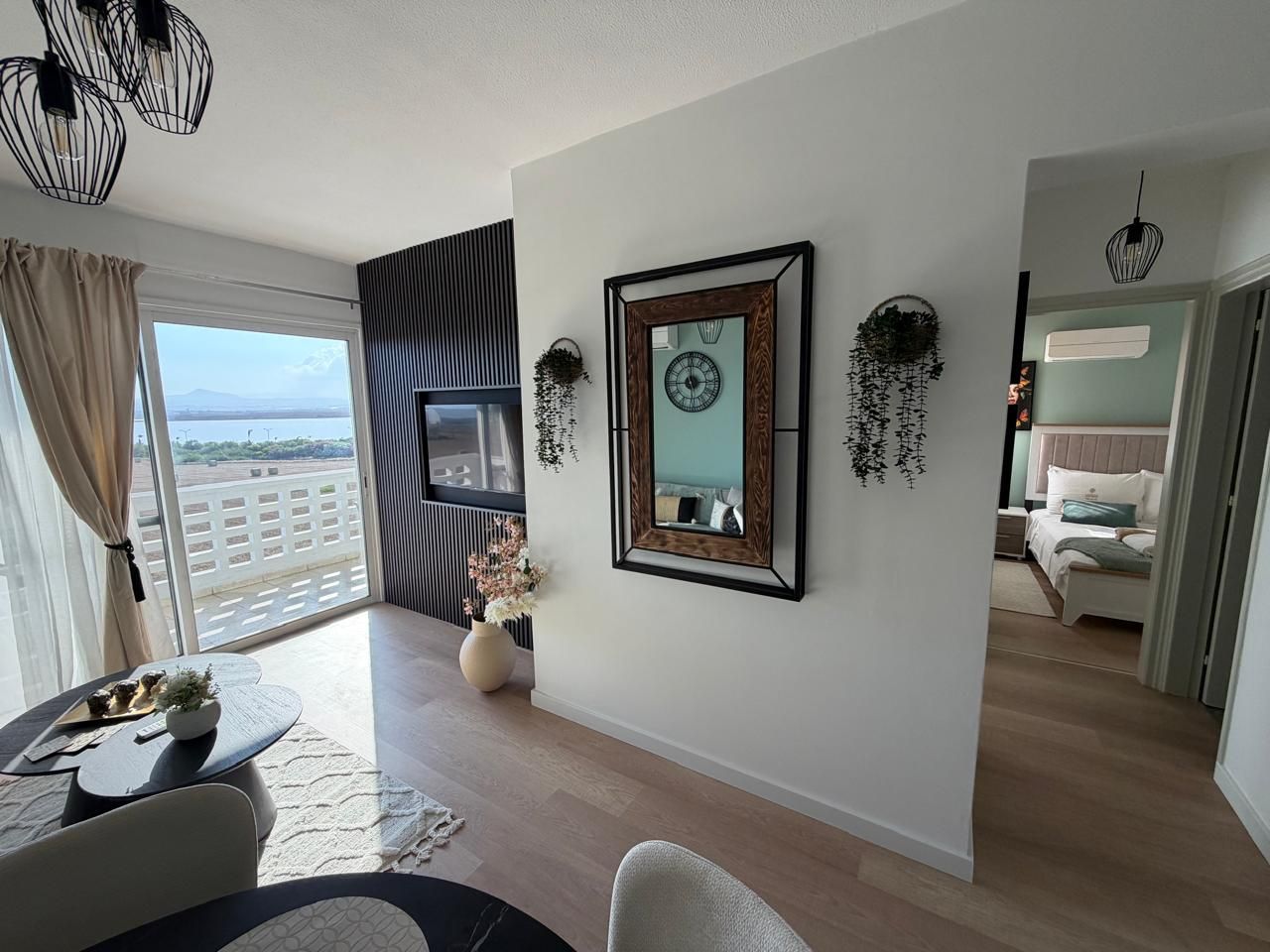 Renovated apartment living area with modern finishes