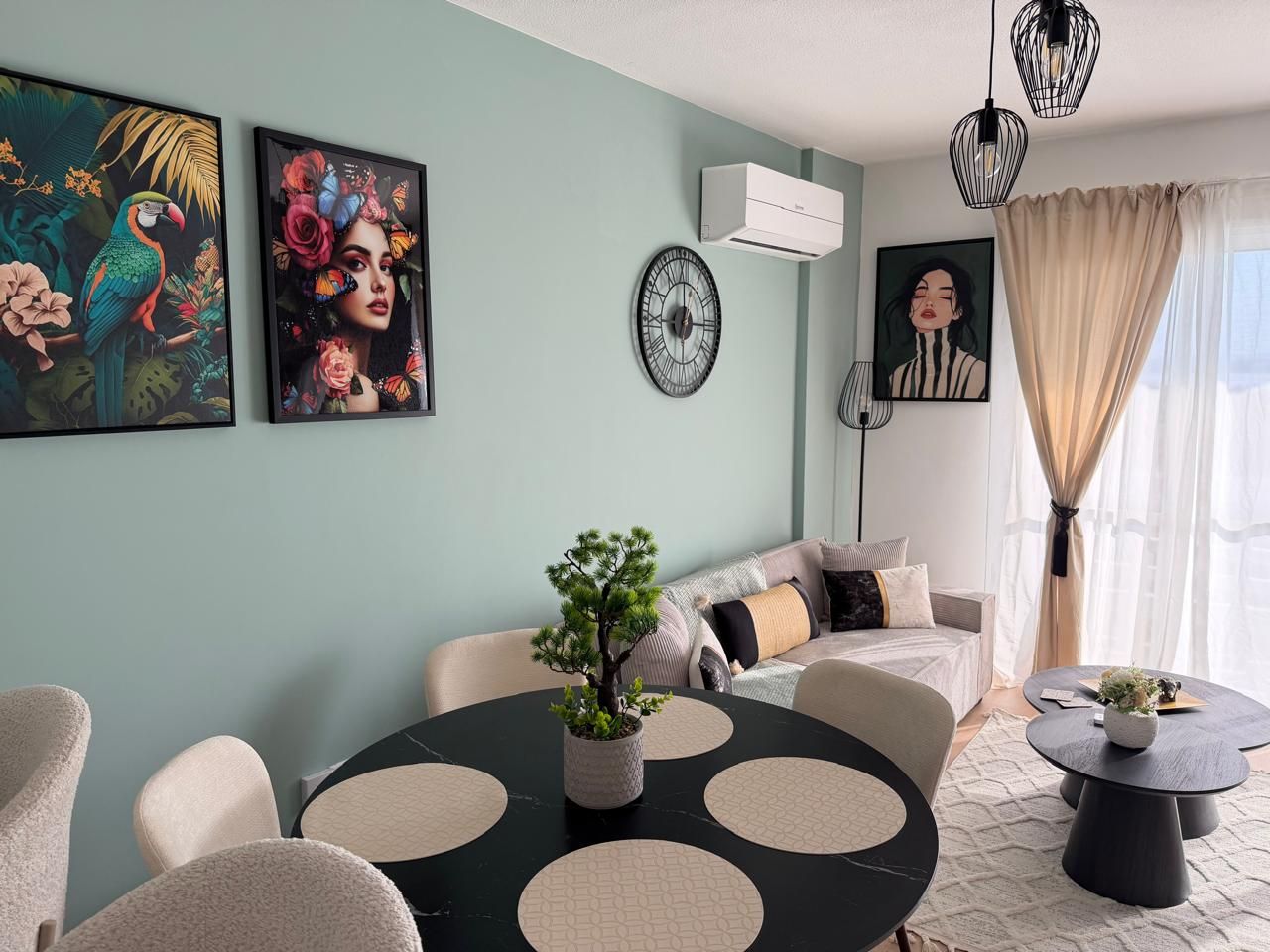 Completed living and dining area after apartment renovation