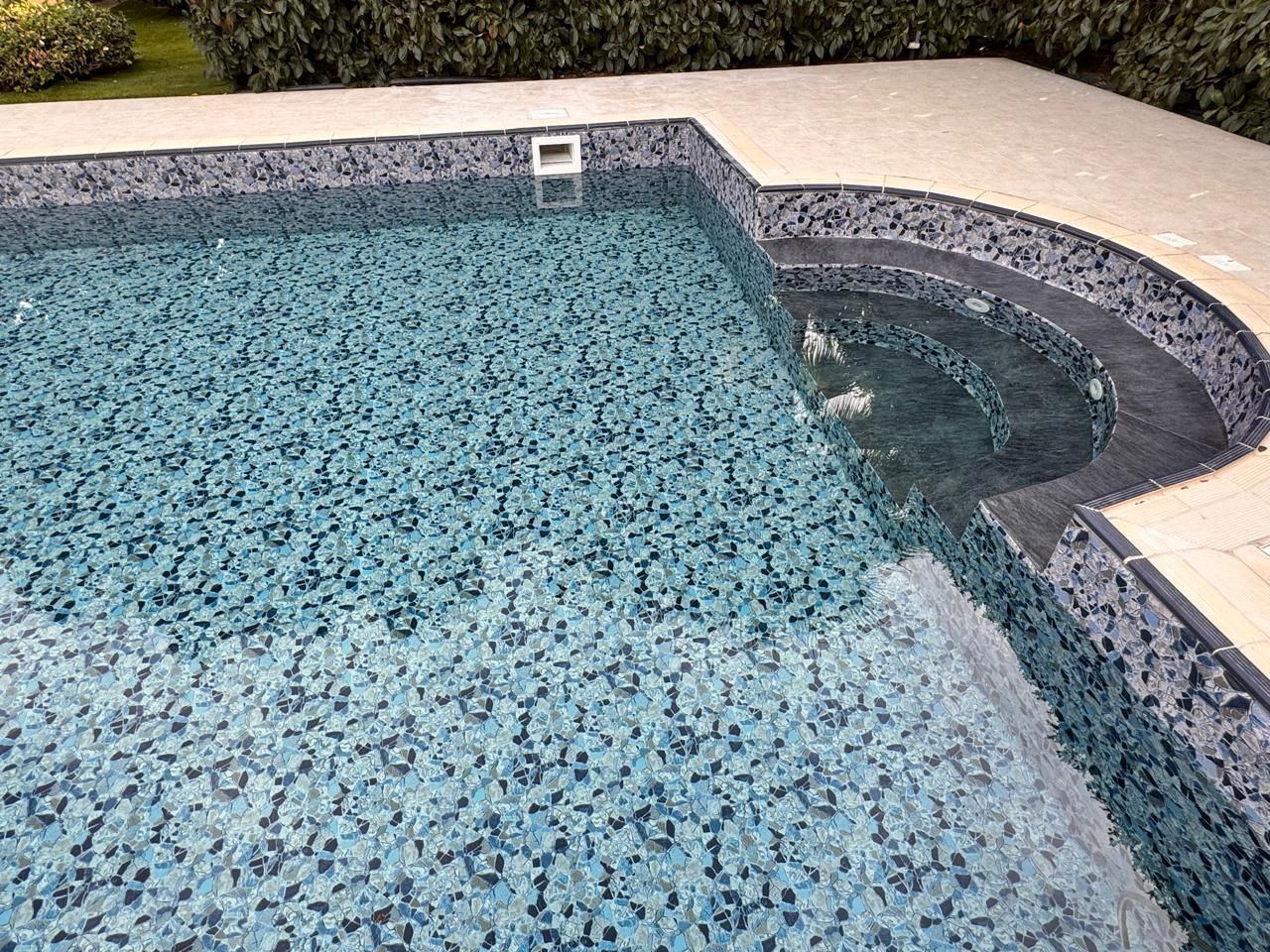 Close-up of the new pool liner under clear water